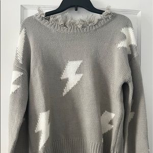 distressed gray lightening bolt sweater